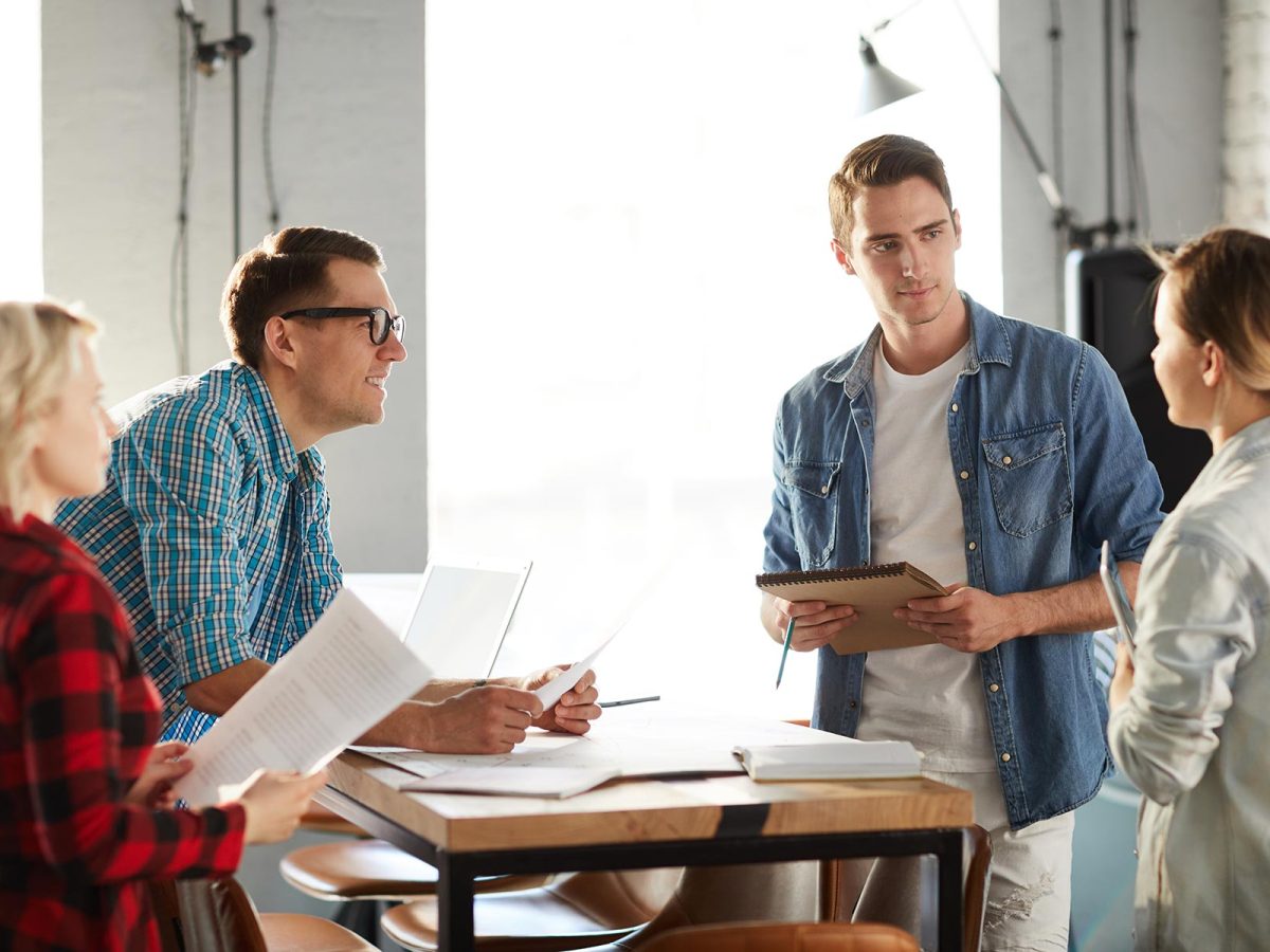 business-meeting-in-modern-office-Y893MZ5.jpg